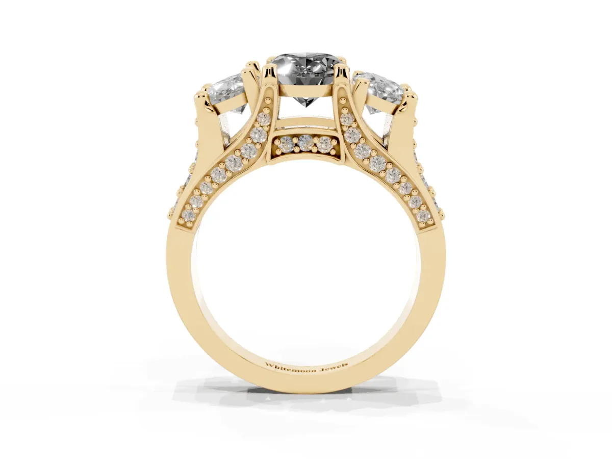 Fancy Black Oval Cut Diamond Three-Stone Ring with Channel Set Band and Four-Prong Setting Yellow gold