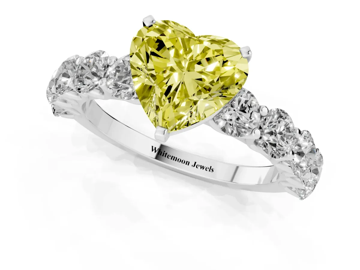 Fancy Yellow Heart Cut Diamond Prong Setting with Side Stones on a Pave Band Silver