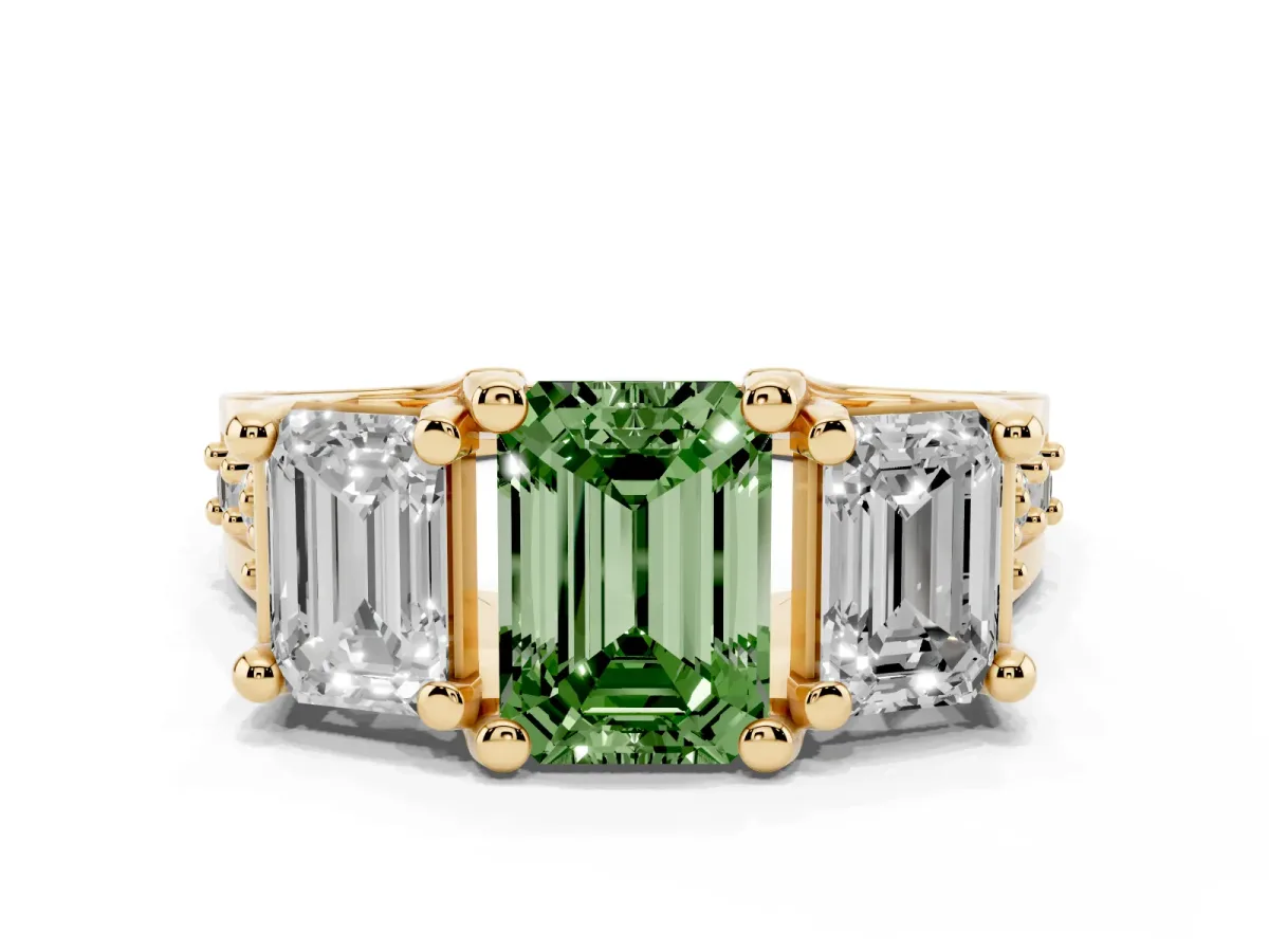 Fancy Green Emerald Cut Diamond Three-Stone Ring with Channel Set Band and Four-Prong Setting Yellow gold