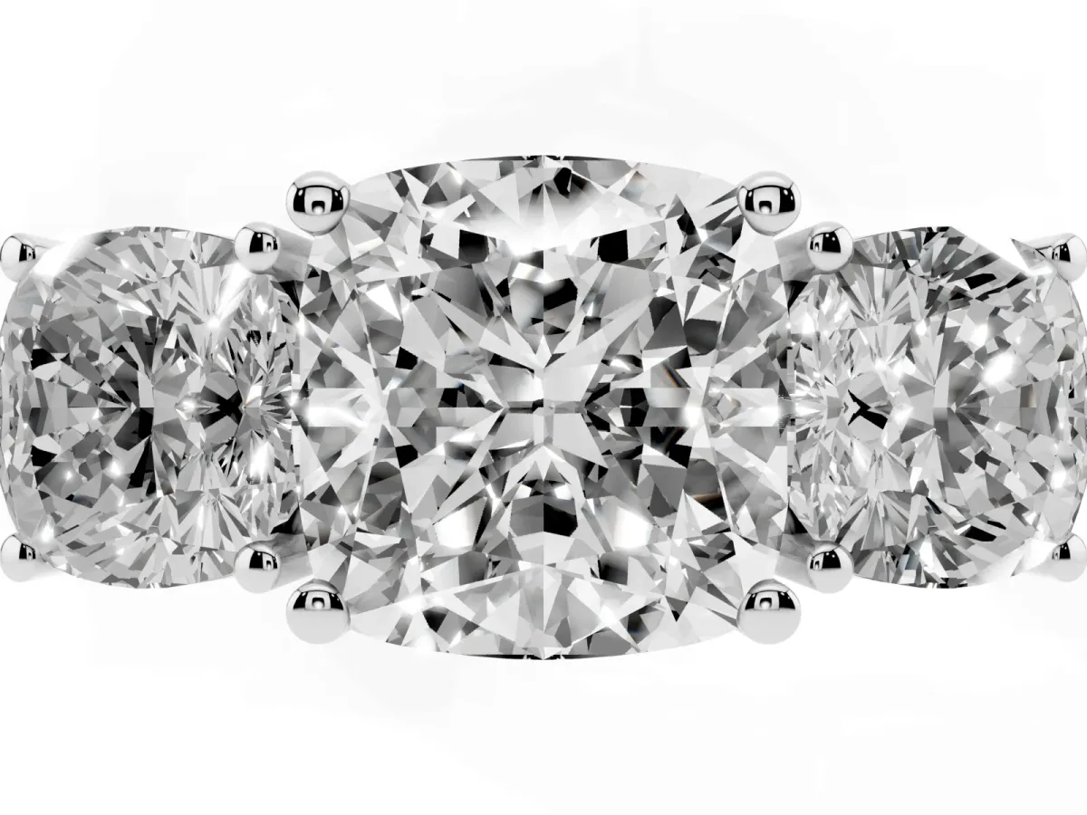 Three-Stone Cushion Cut Cut Diamond Engagement Ring with Flat Band and Four-Prong Setting Silver