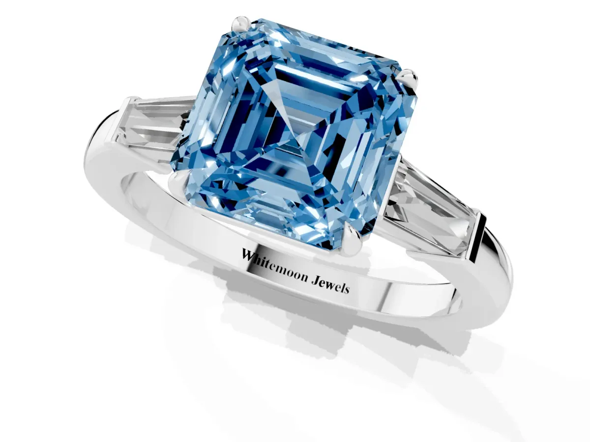 Fancy Blue Asscher Cut Diamond Three-Stone Ring with Tapered Baguette Side Stones and Prong Setting Silver
