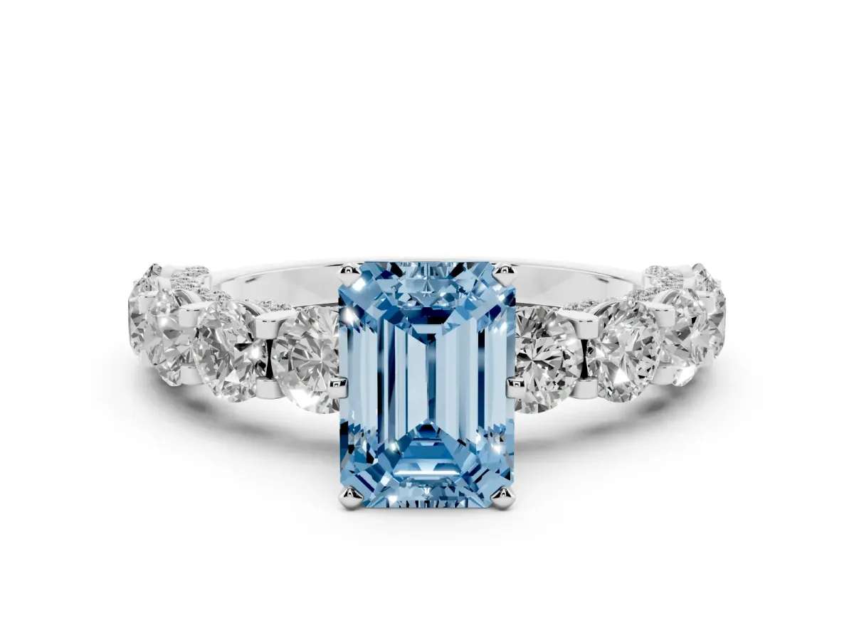 Fancy Blue Emerald Cut Diamond Side Stone Engagement Ring with Four-Prong Setting Silver