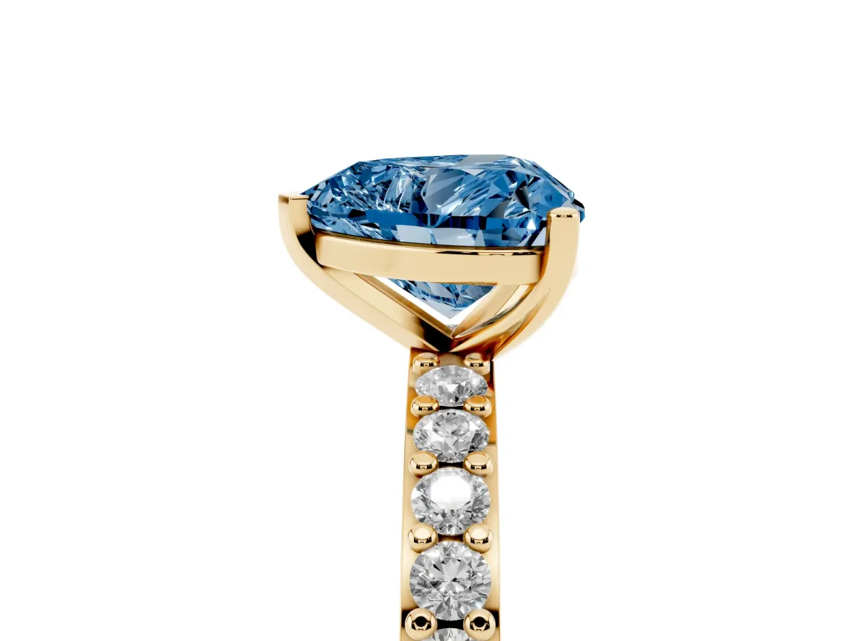 Fancy Blue Heart Cut Cut Diamond Solitaire with Pave Band and Four-Prong Setting Yellow gold