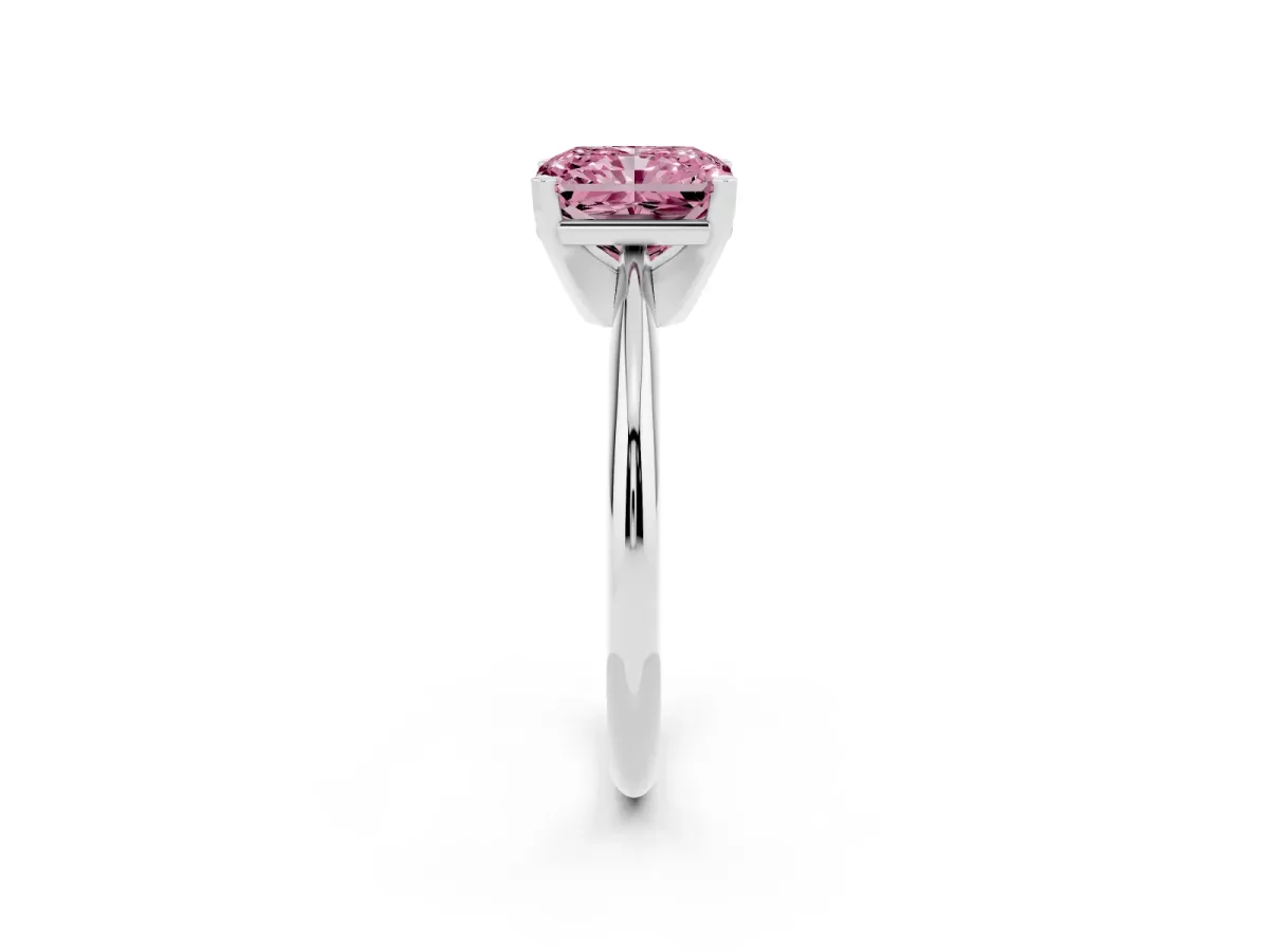 Fancy Pink Radiant Cut Cut Solitaire Ring with Four-Prong Setting on a Classic Band Silver