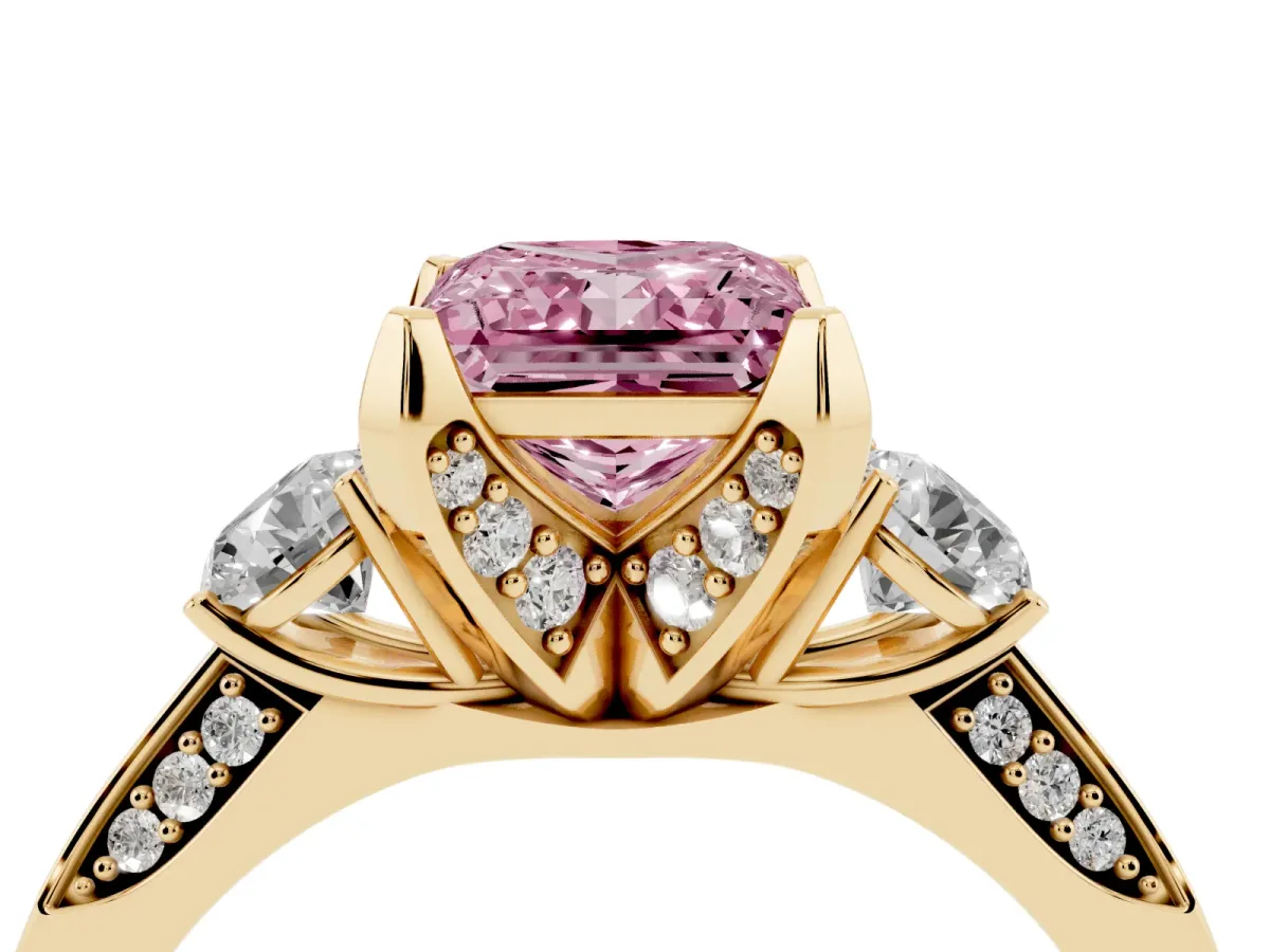 Fancy Pink Princess Cut Brilliant Three-Stone Diamond Ring with Pavé Band and Four-Prong Setting Yellow gold