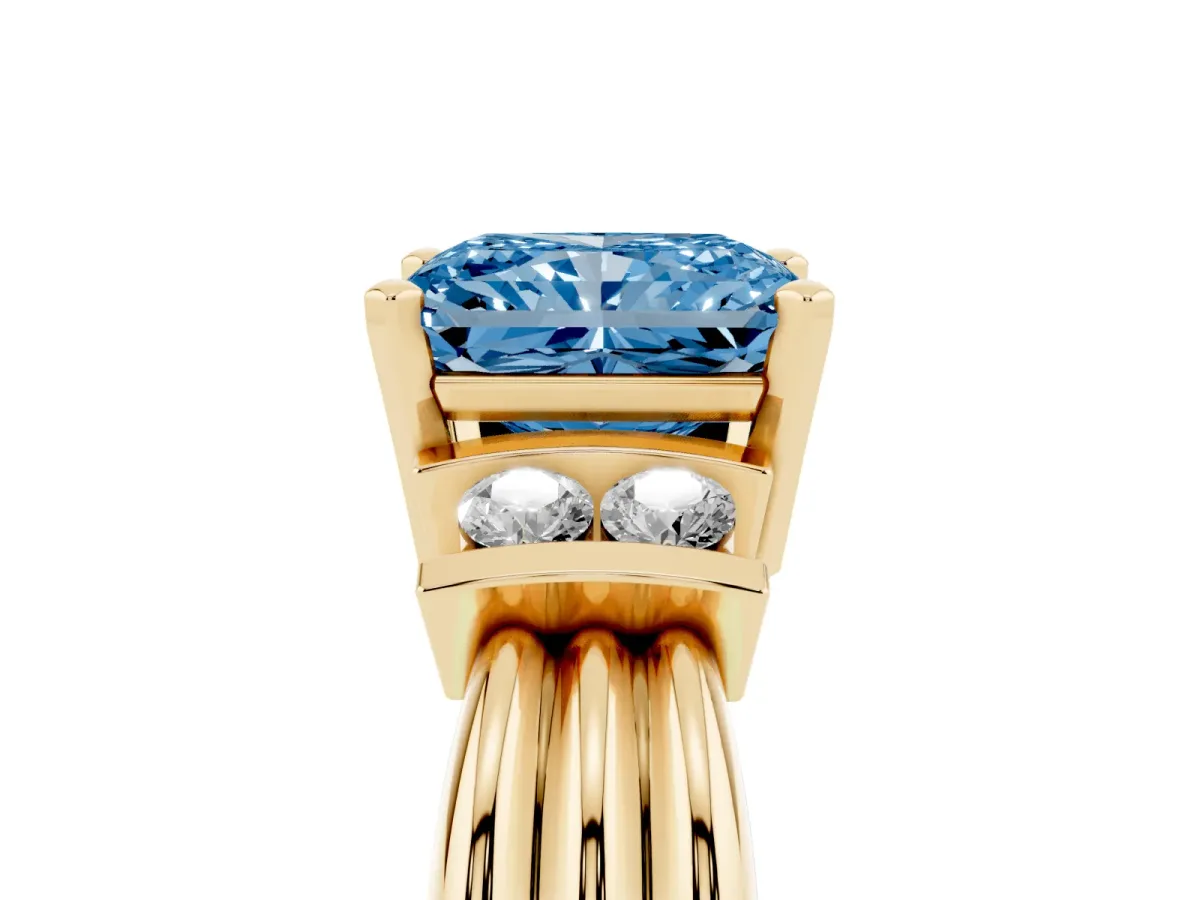 Fancy Blue Radiant Cut Cut Three-Stone Channel Set Ring with Bar Prongs Yellow gold
