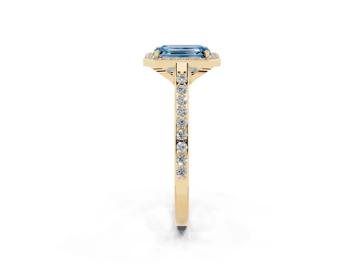 Fancy Blue Emerald Cut Diamond Halo Engagement Ring with Round Pavé Shoulders and Prong Setting Yellow gold