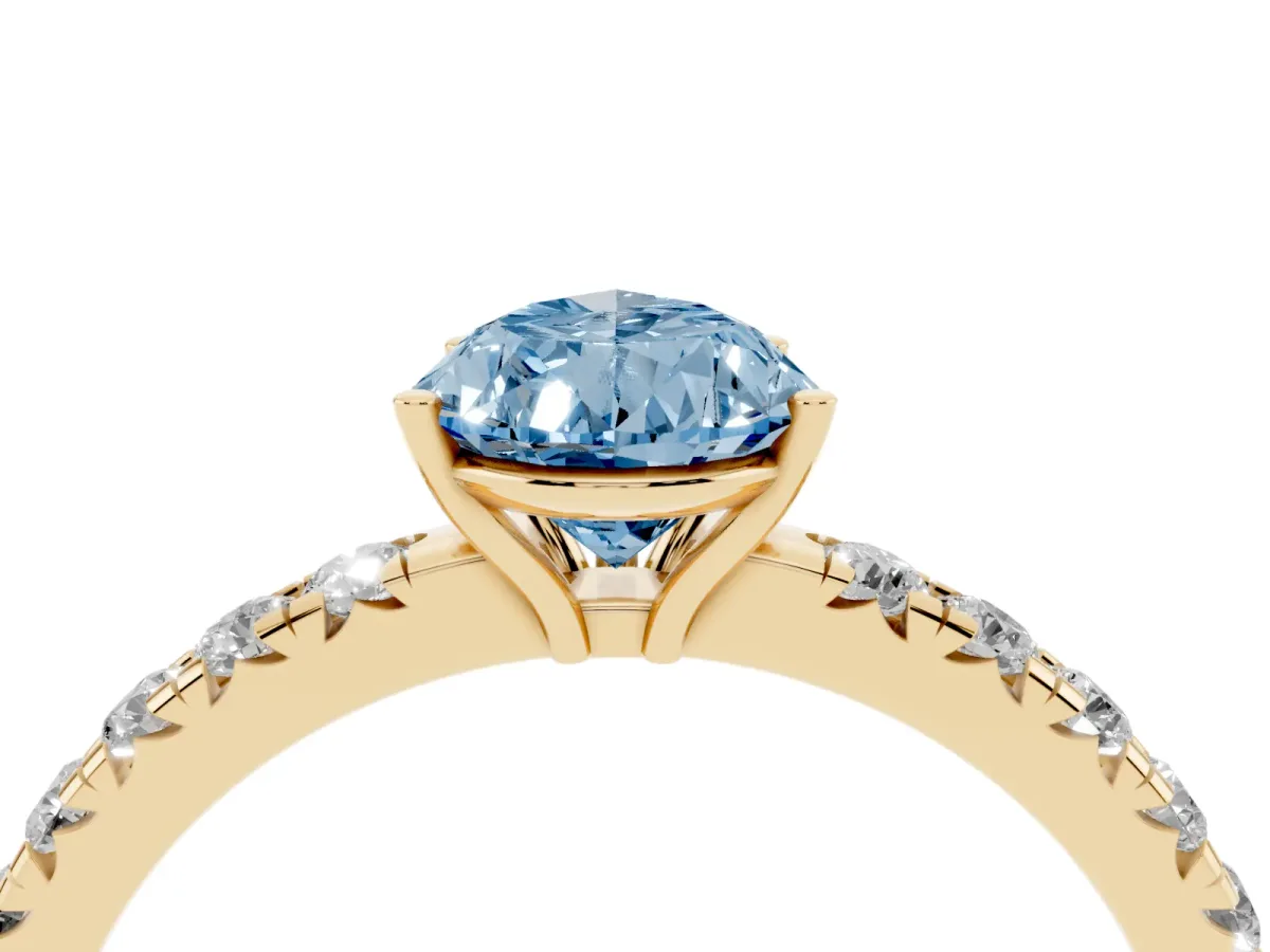 Fancy Blue Pear Cut Diamond Pavé Solitaire Engagement Ring with Four-Prong Setting Yellow gold