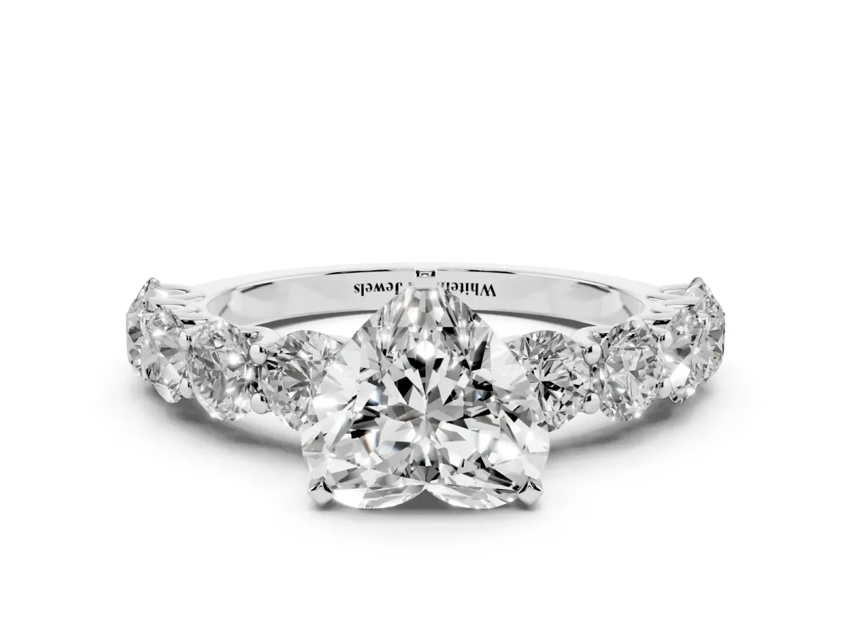 Heart Cut Diamond Prong Setting with Side Stones on a Pave Band Silver