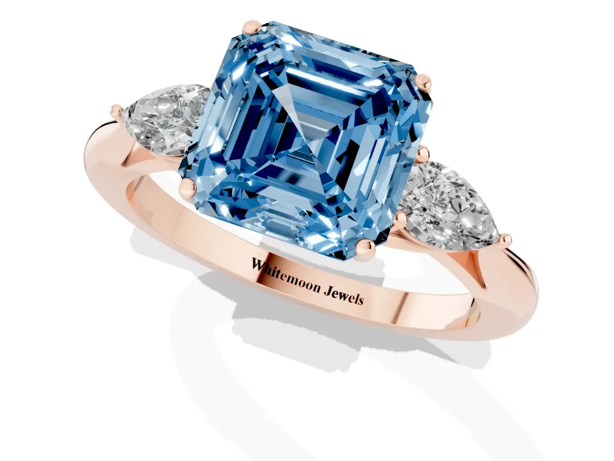 Fancy Blue Asscher Cut Diamond Three-Stone Ring with Pear Side Stones and Prong Setting Rose gold