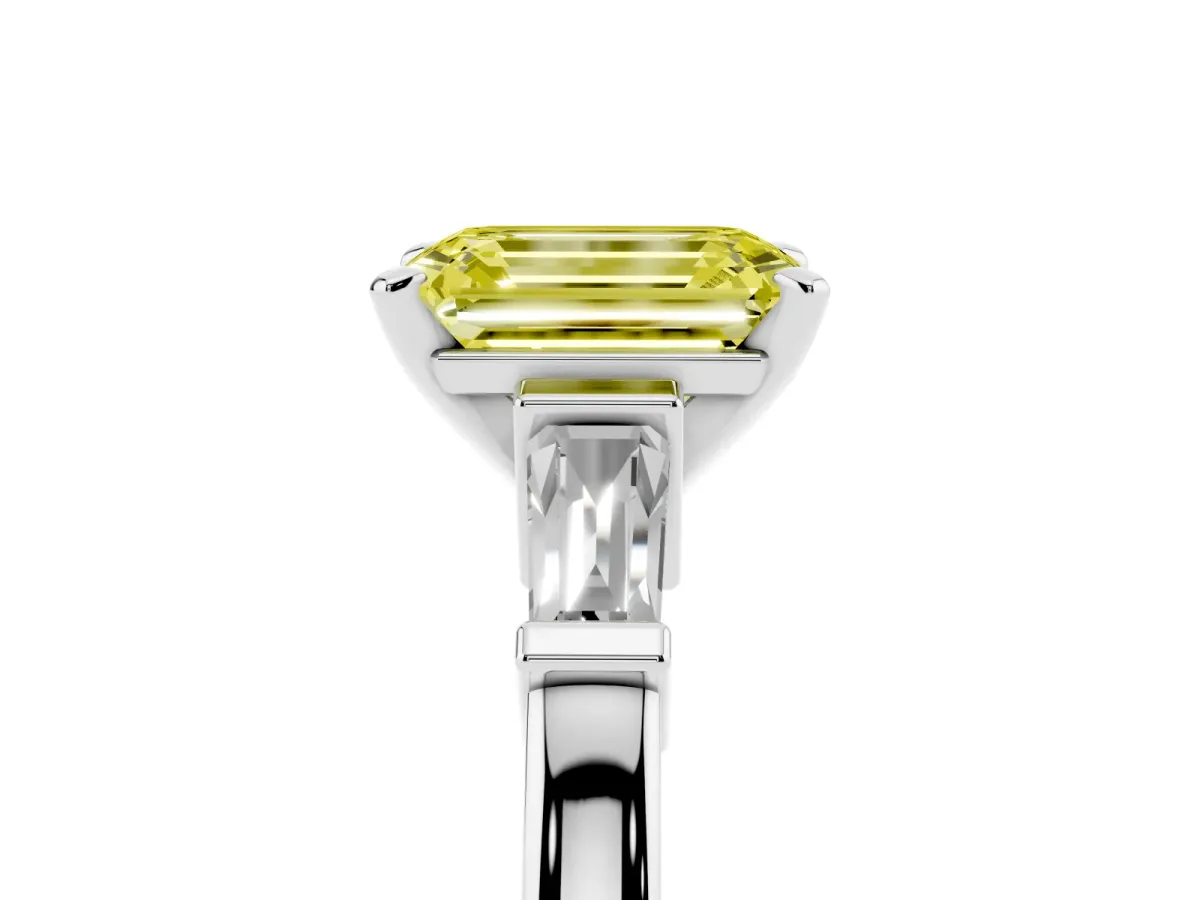 Fancy Yellow Emerald Cut Cut Diamond Solitaire Ring with Tapered Baguette Accents and Four-Prong Setting Silver