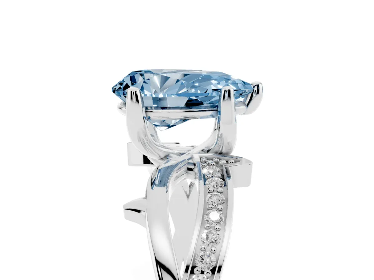 Fancy Blue Pear Cut Solitaire Twist Band with Pavé Accents and Four-Prong Setting Platinum