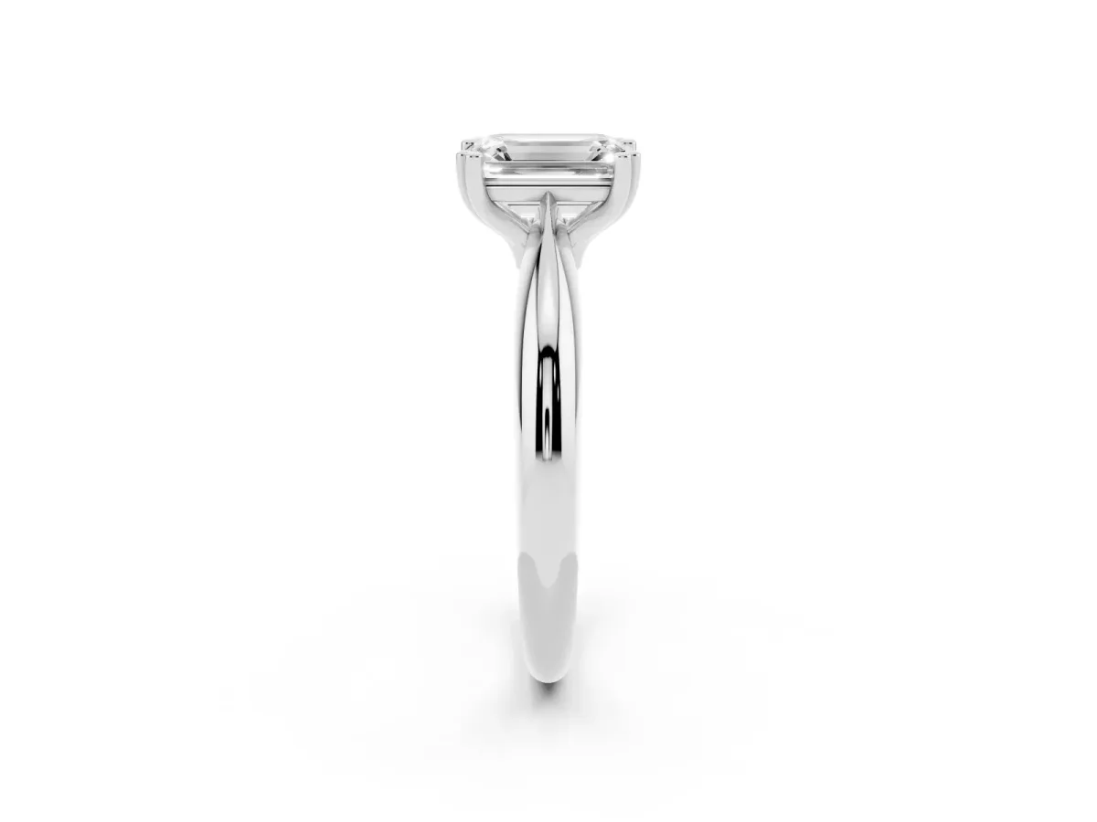 Emerald Cut Cut Solitaire Engagement Ring with Tapered Band and Four-Prong Setting Silver