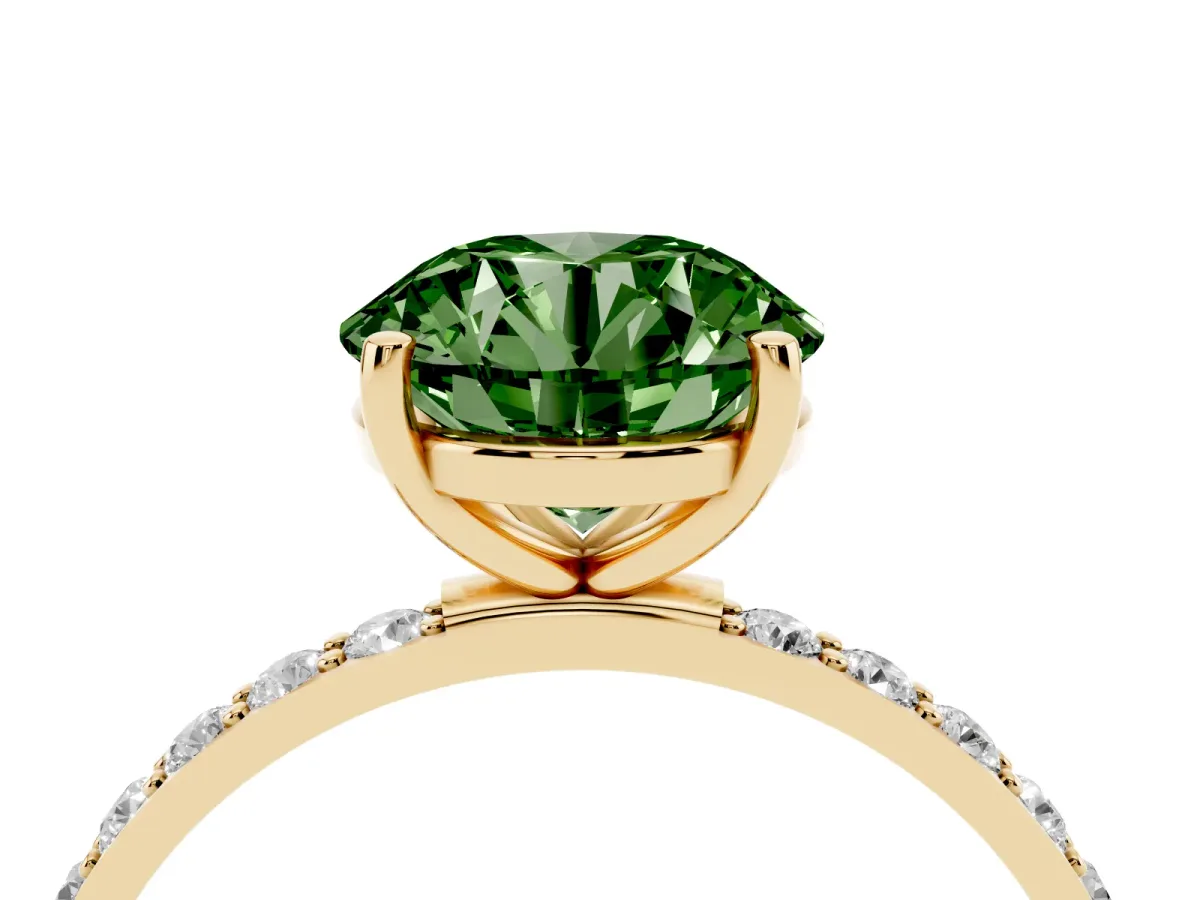 Fancy Green Round Cut Diamond Solitaire Ring with Round Pavé Shoulders and Prong Setting Yellow gold