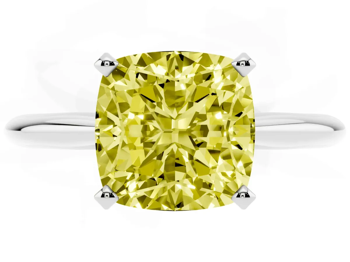 Fancy Yellow Cushion Cut Cut Solitaire Ring with Four-Prong Setting on a Classic Band Silver