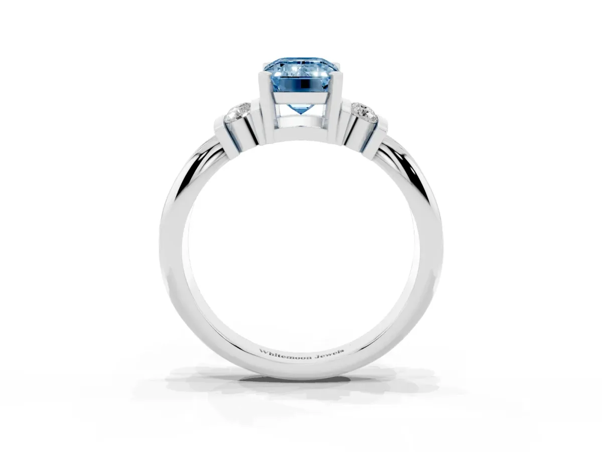 Fancy Blue Emerald Cut Cut Three-Stone Channel Set Ring with Bar Prongs Platinum