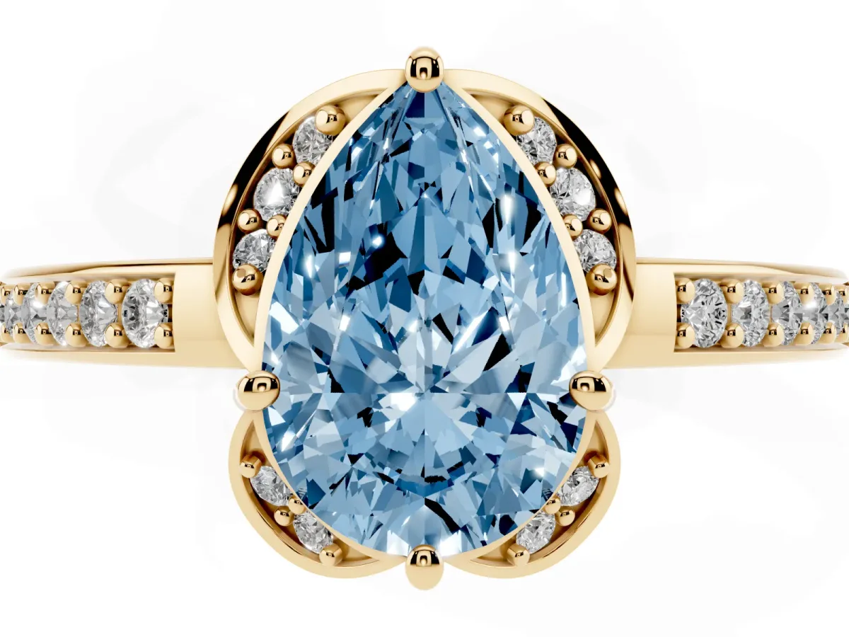 Fancy Blue Pear Cut Cut Halo Diamond Ring with Channel Set Band and Four-Prong Setting Yellow gold