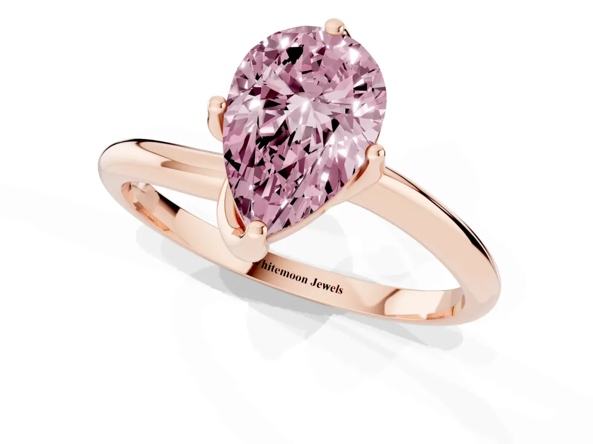 Fancy Pink Pear Cut Diamond Solitaire Engagement Ring with Four-Prong Setting and Classic Band Rose gold