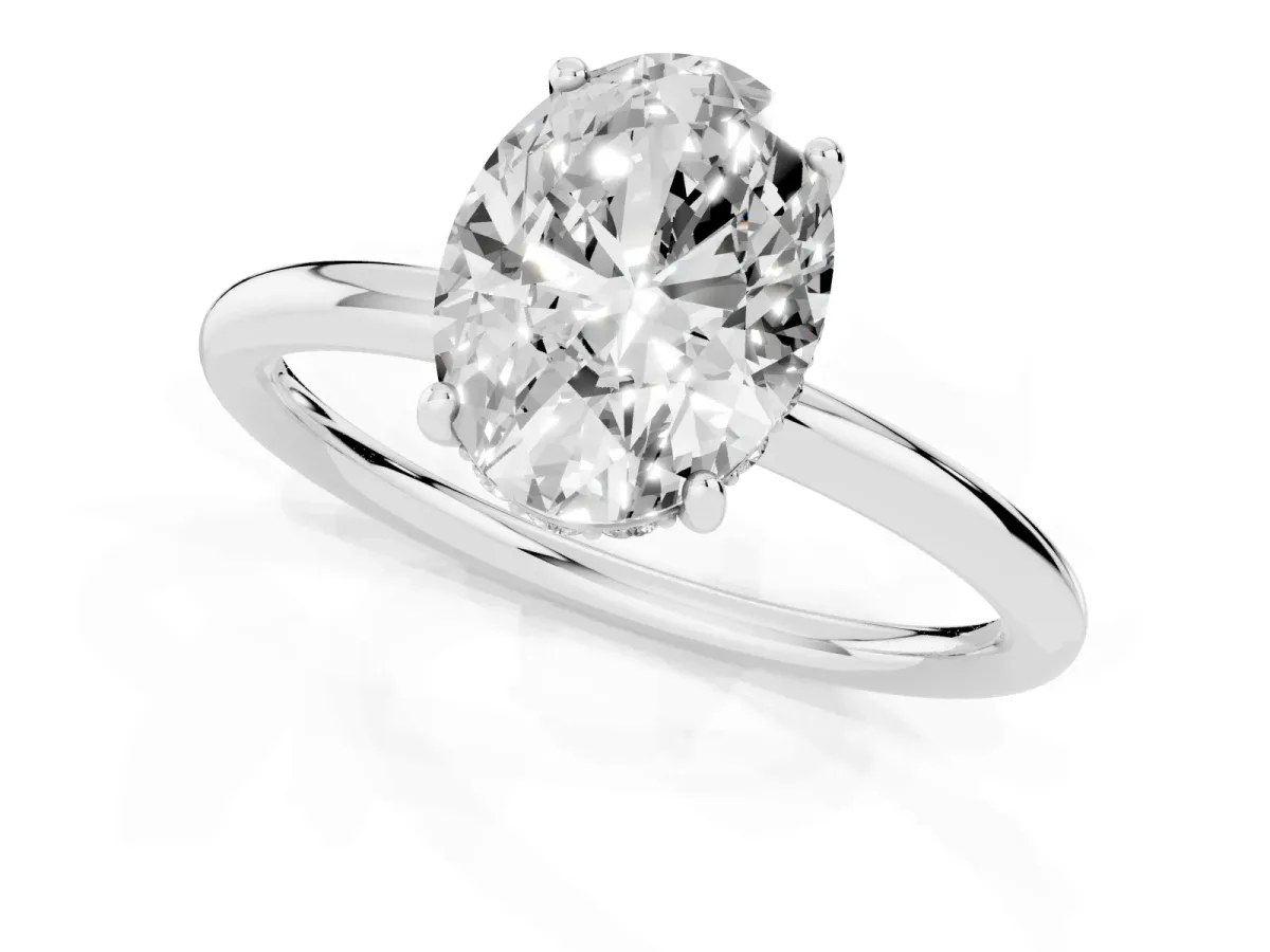 Oval Cut Solitaire Diamond Ring with a Classic Band and Four-Prong Setting Platinum