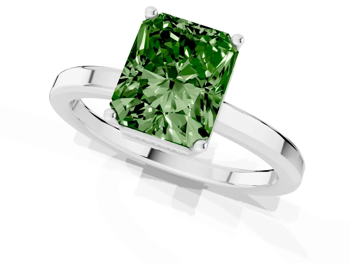 Fancy Green Radiant Cut Cut Solitaire Engagement Ring with Four-Prong Setting on a Classic Band Silver