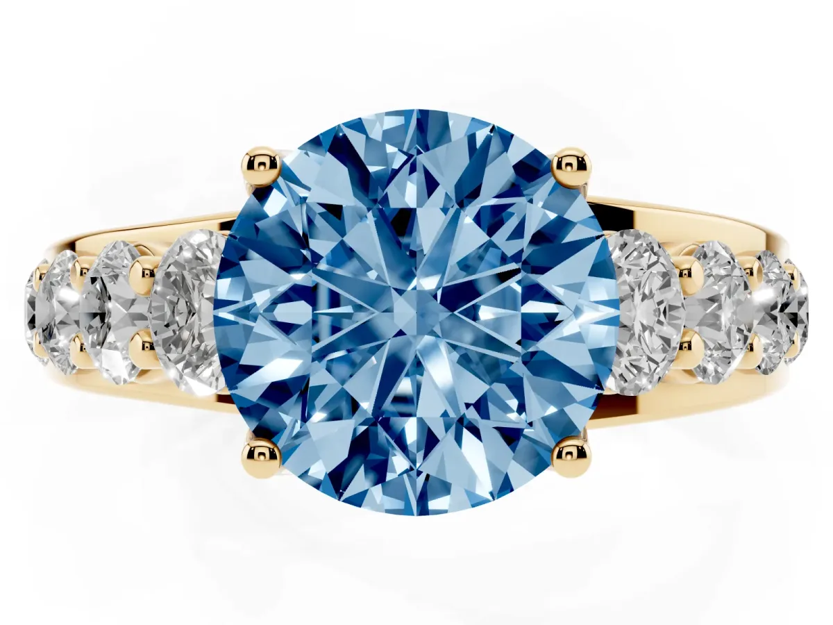Fancy Blue Round Cut Diamond Engagement Ring with Pavé Band and Four-Prong Setting Yellow gold