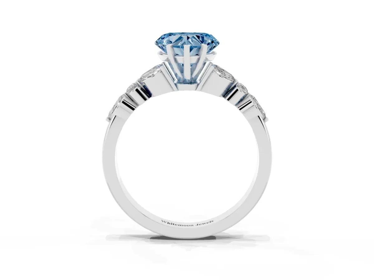 Fancy Blue Heart Cut Diamond Solitaire Ring with Side Stones and Four-Prong Setting Platinum
