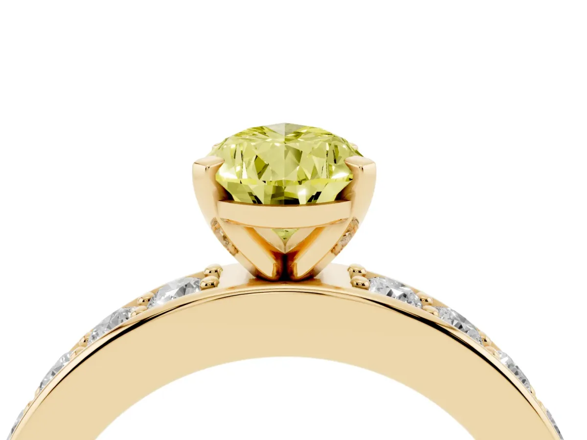 Fancy Yellow Pear Cut Diamond Engagement Ring with Channel Set Round Band and Prong Setting Yellow gold