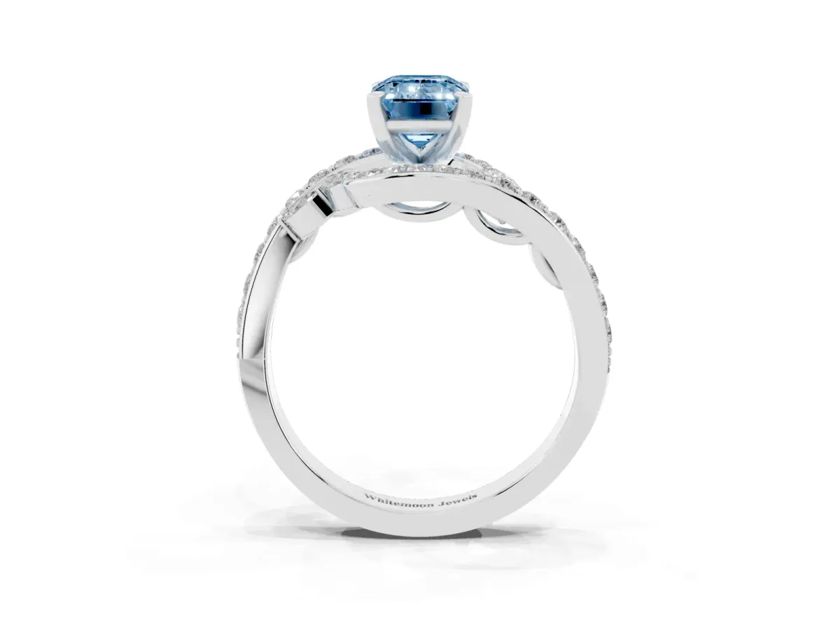 Fancy Blue Emerald Cut Solitaire with Pavé Twist Band and Four-Prong Setting Silver
