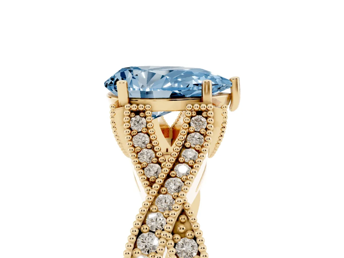 Fancy Blue Pear Cut Cut Diamond Twisted Band with Milgrain Pave Setting and Four-Prong Setting Yellow gold