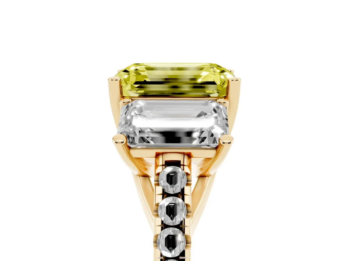 Fancy Yellow Three-Stone Emerald Cut Diamond Ring with Round Pavé Band and Prong Setting Yellow gold