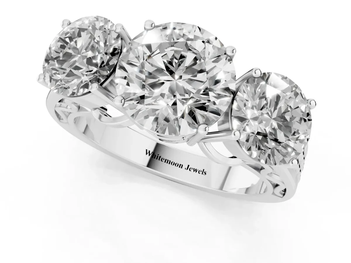 Round Cut Diamond Three-Stone Ring with Prong Setting and Textured Band Silver