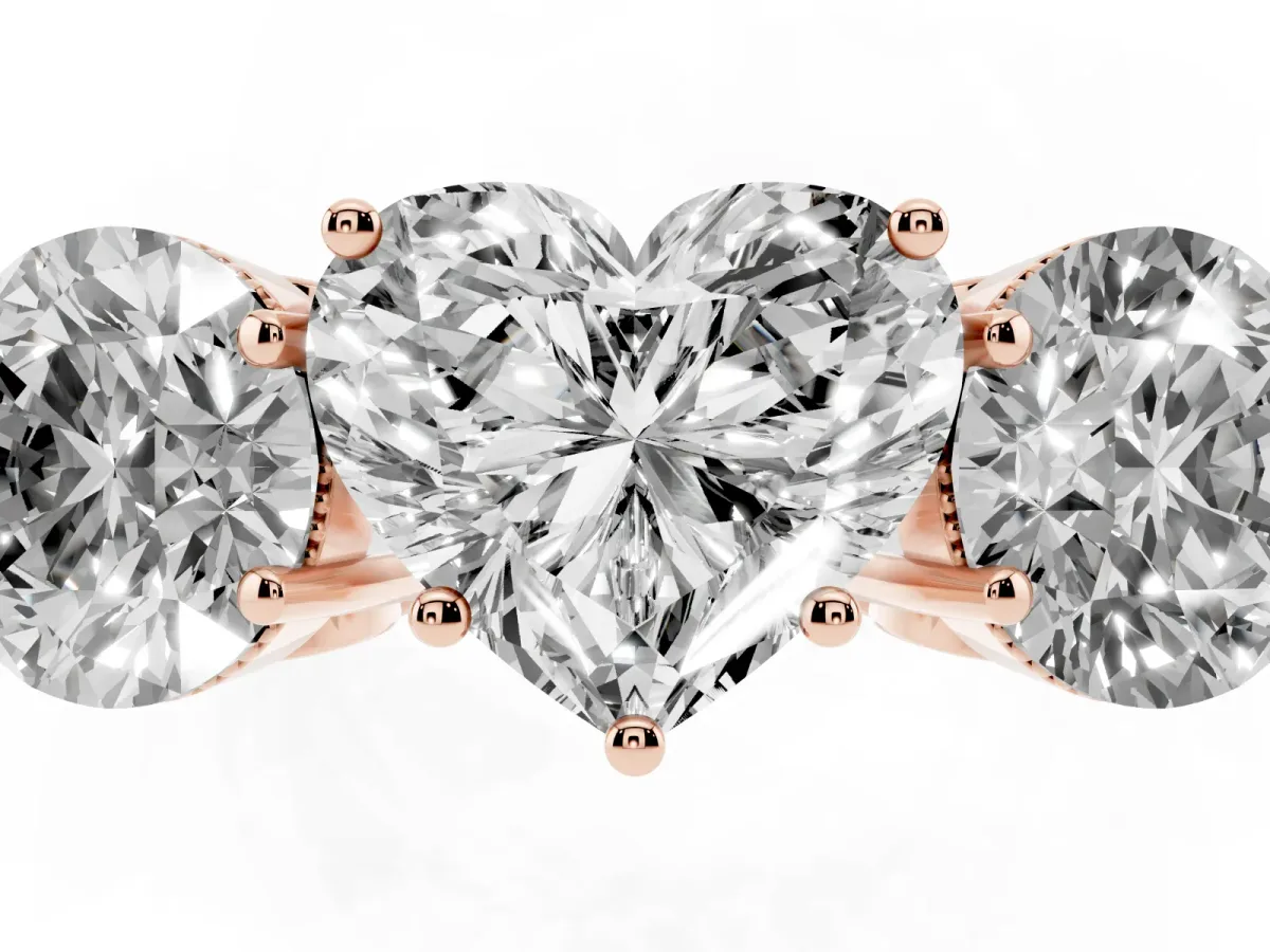Three-Stone Heart Cut Diamond Engagement Ring with Prong Setting on a Classic Band Rose gold