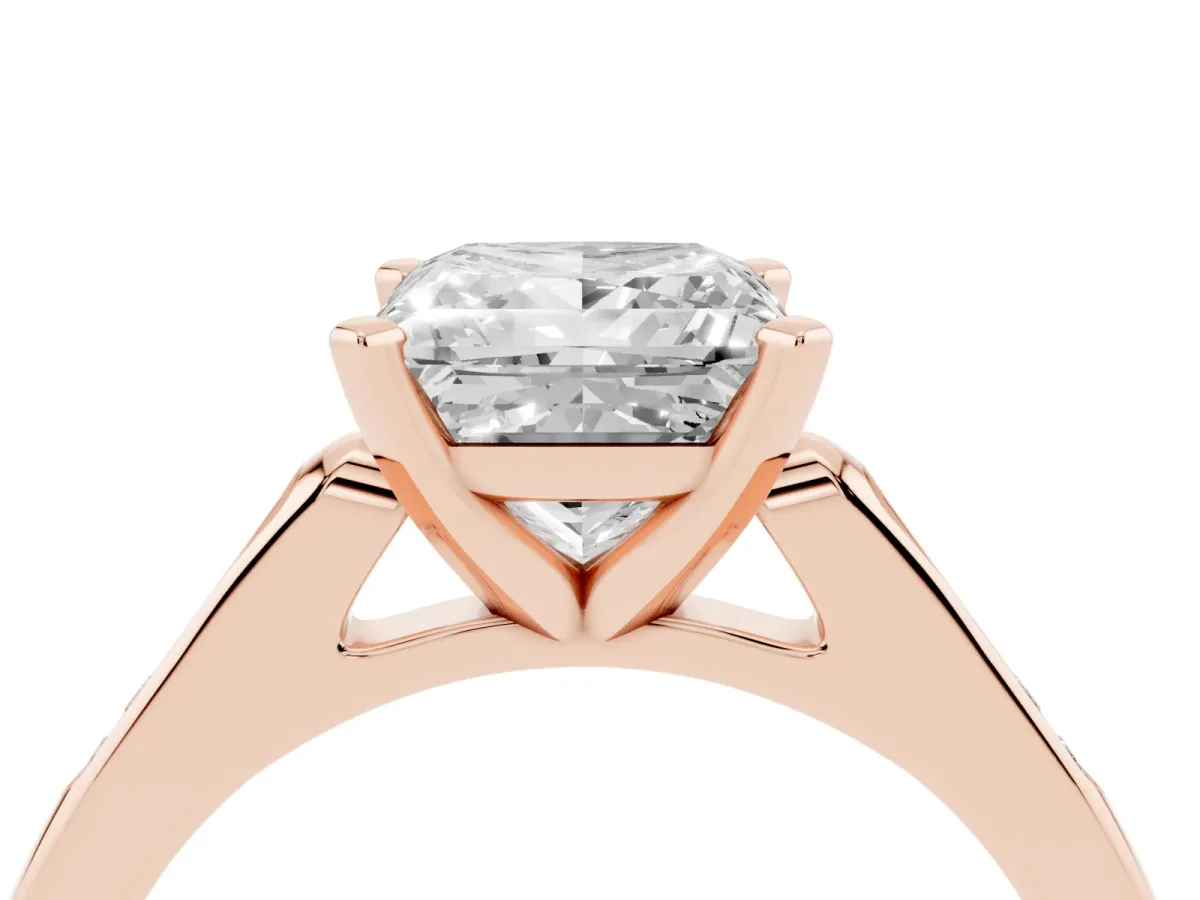 Princess Cut Diamond Solitaire Ring with Channel Set Round Band and Prong Setting Rose gold