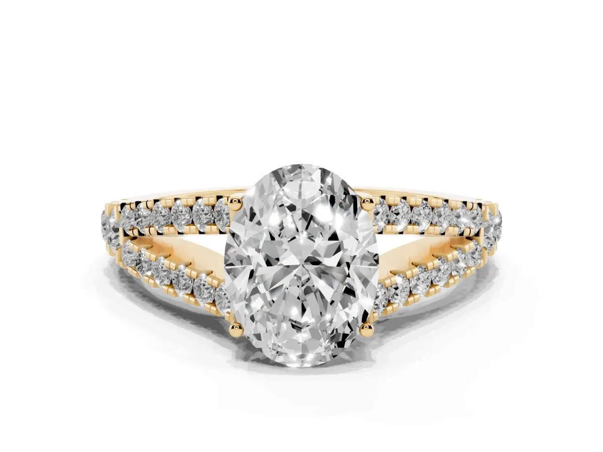 Oval Cut Diamond Split Shank Engagement Ring with Round Pavé and Prong Setting Yellow gold