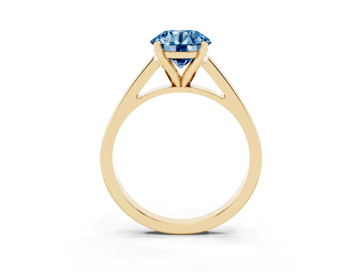 Fancy Blue Round Cut Solitaire Engagement Ring with Four-Prong Setting and Tapered Band Yellow gold