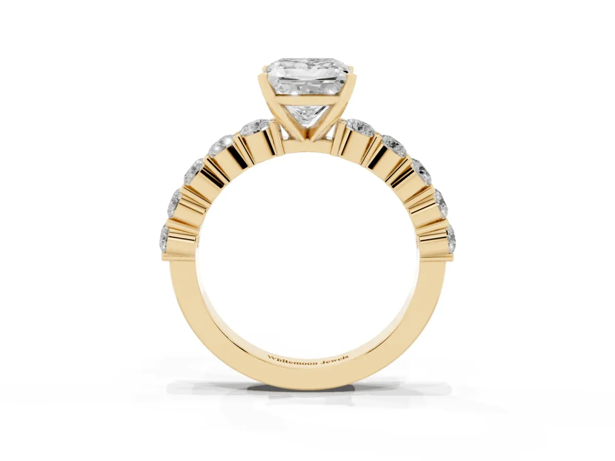 Princess Cut Diamond Solitaire Ring with Shared Prong Round Side Stones Yellow gold