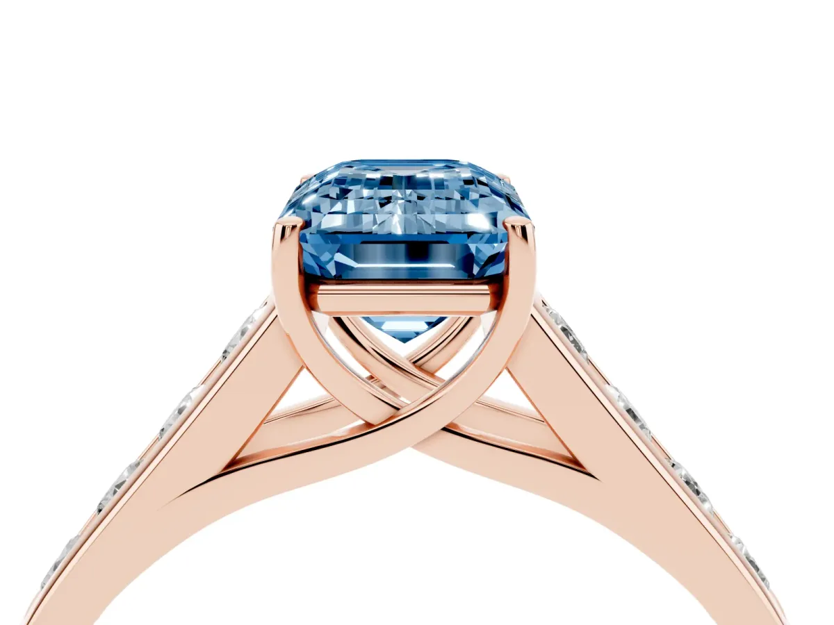 Fancy Blue Emerald Cut Brilliant Channel-Set Solitaire Ring with Four-Prong Setting Rose gold