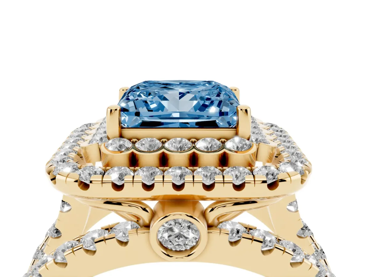Fancy Blue Princess Cut Diamond Double Halo Ring with Round Pavé Split Shank and Prong Setting Yellow gold