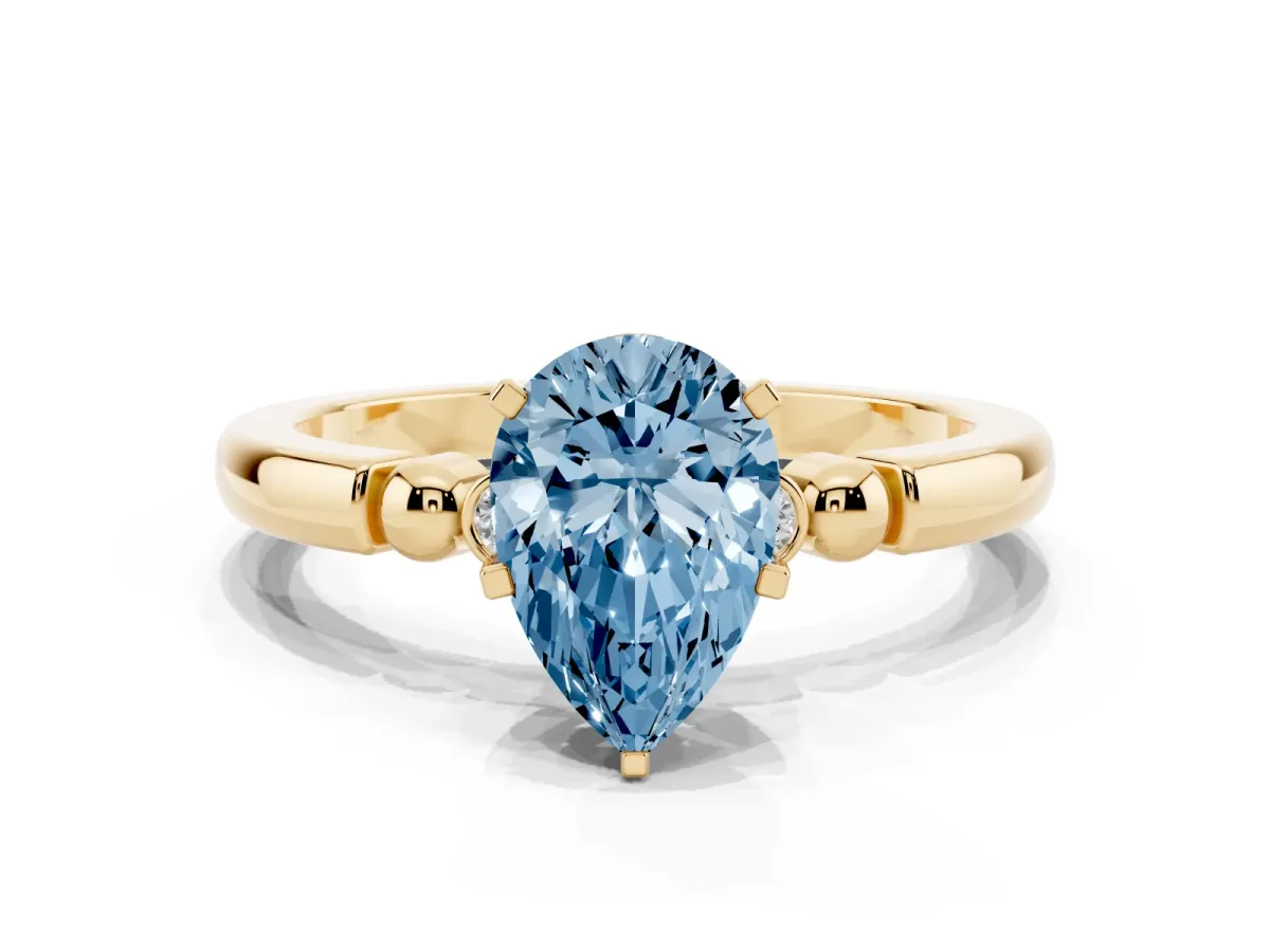 Fancy Blue Pear Cut Solitaire Beaded Band with Four-Prong Setting Yellow gold