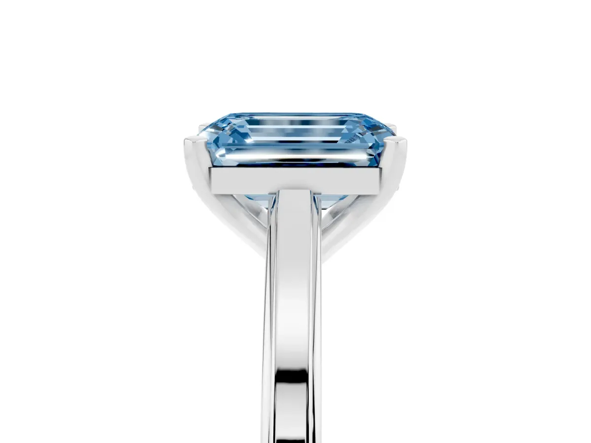 Fancy Blue Emerald Cut Solitaire Diamond Ring with Four-Prong Setting and Classic Band Platinum