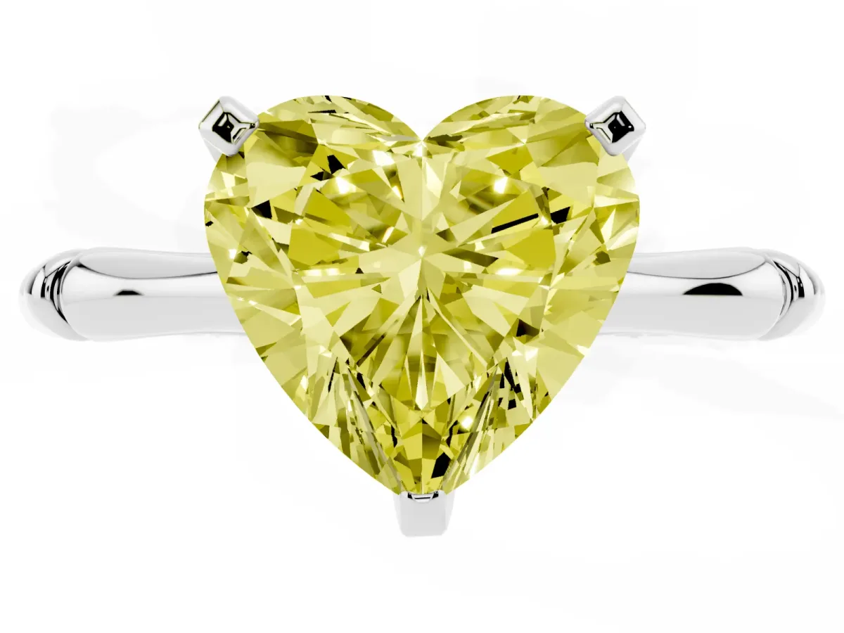 Fancy Yellow Heart Cut Solitaire Diamond Ring with Bamboo Band and Four-Prong Setting Silver