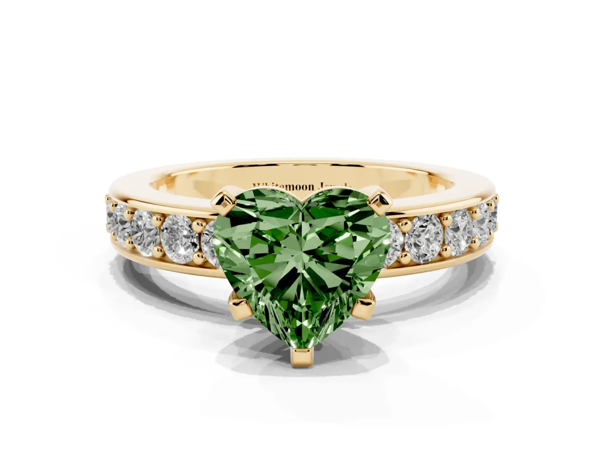 Fancy Green Heart Cut Diamond Engagement Ring with Channel Set Round Band and Prong Setting Yellow gold