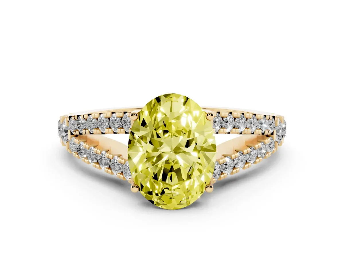 Fancy Yellow Oval Cut Diamond Split Shank Engagement Ring with Round Pavé and Prong Setting Yellow gold
