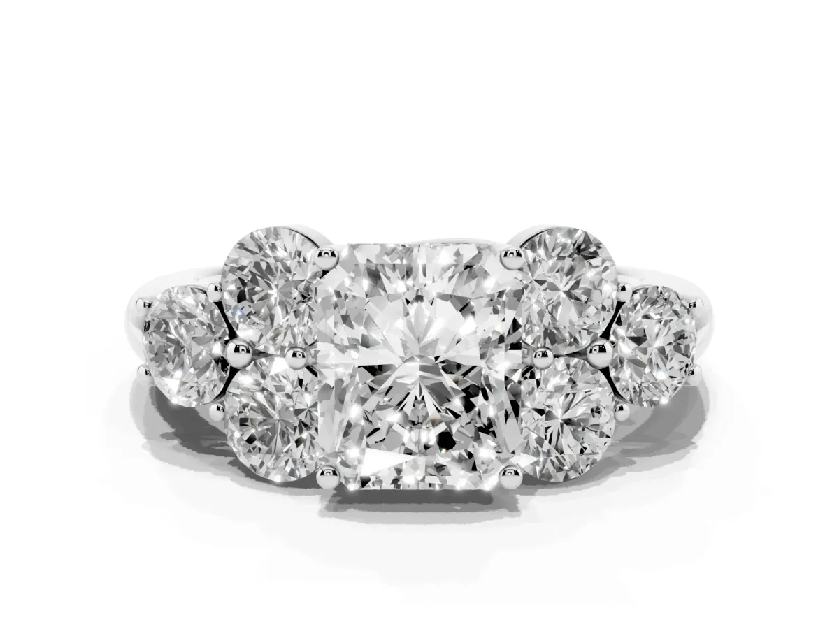Radiant Cut Cut Diamond Cluster Ring with Round Accent Stones and Prong Setting on a Classic Band White gold