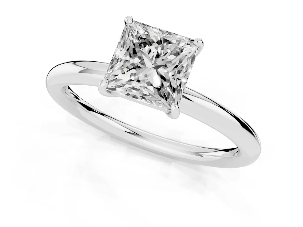 Princess Cut Solitaire Diamond Ring with Four-Prong Setting on a Plain Band Platinum