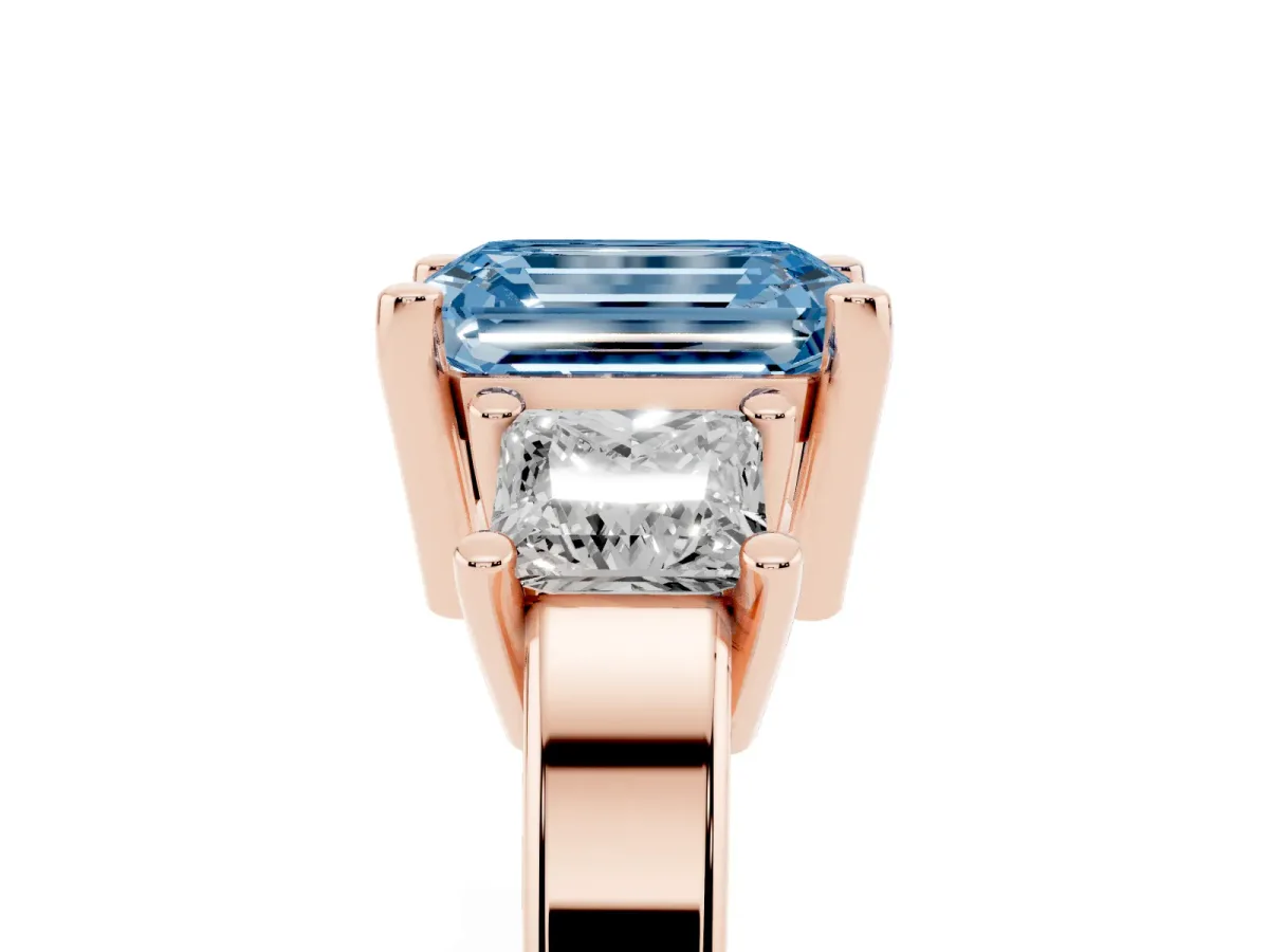 Fancy Blue Three-Stone Emerald Cut Cut Solitaire Ring with Prong Setting Rose gold
