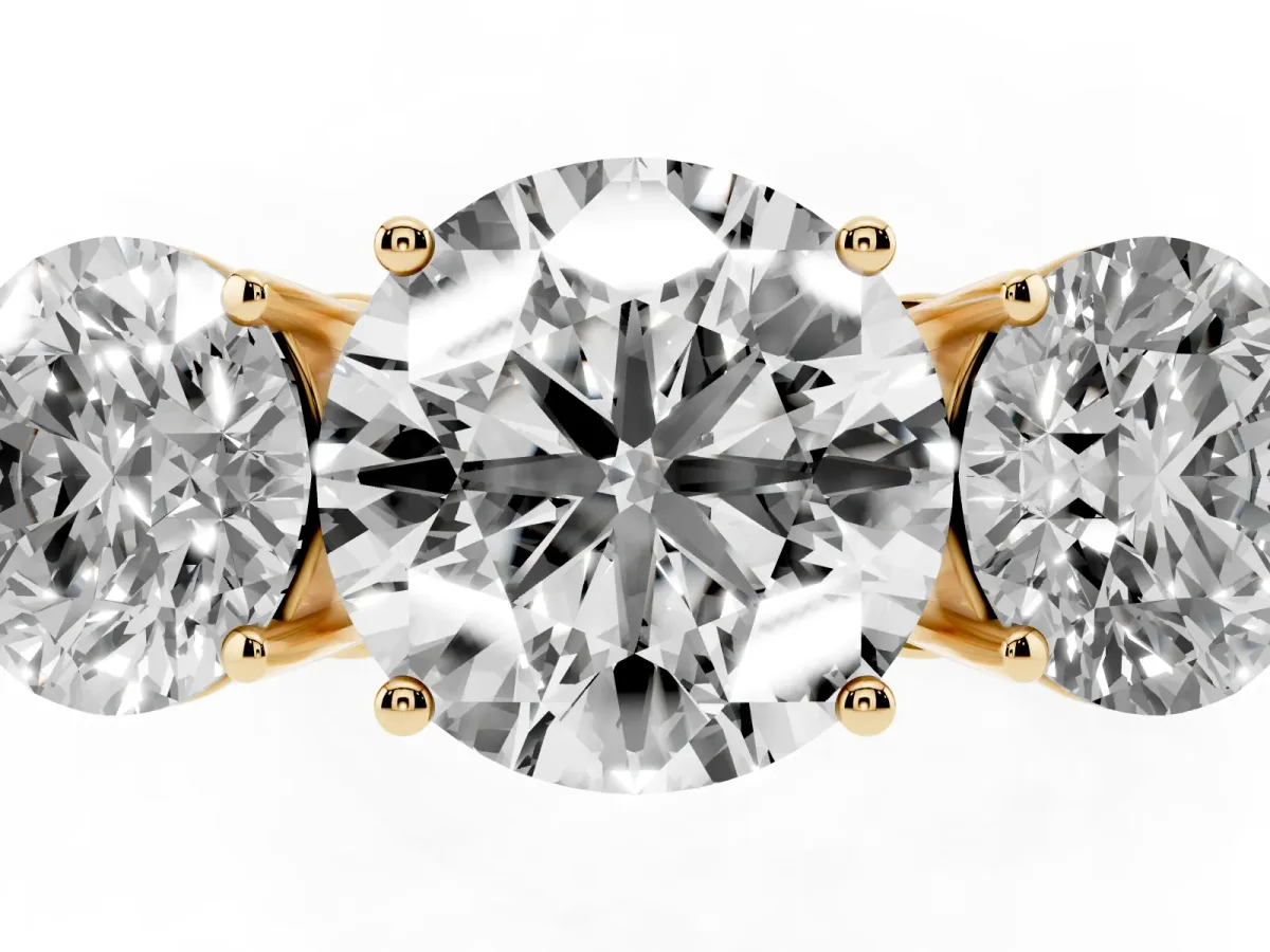 Round Cut Diamond Three-Stone Ring with Prong Setting and Textured Band Yellow gold