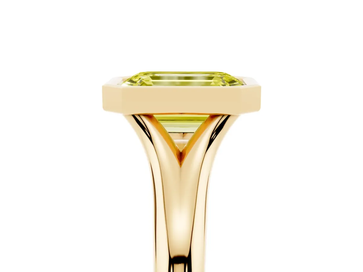 Fancy Yellow Bezel Set Emerald Cut Solitaire Diamond Ring with Smooth Band Yellow gold