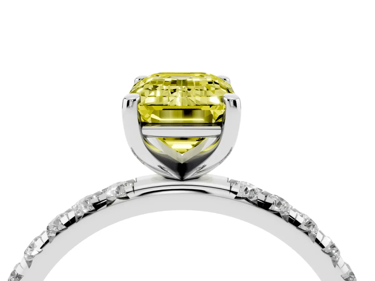 Fancy Yellow Emerald Cut Cut Diamond Solitaire Ring with Micro Pave Band and Four Prong Setting Silver