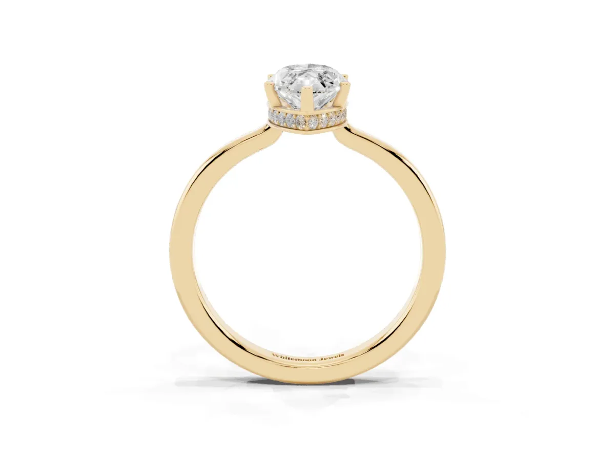 Marquise Cut Cut Solitaire Engagement Ring with Four-Prong Setting on a Classic Band Yellow gold